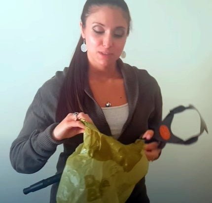 Courtney demonstrates how to load a dootie bag onto a gogo stik pooper scooper